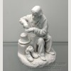 Фарфоровая статуэтка "Мужик с краюхой хлеба" (Крестьянин посыпающий хлеб солью) по модели Гарднера. Бисквит.