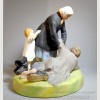 Фарфоровая статуэтка "Крестьянка с ребенком поднимающая пьяного мужа". Вербилки. Цена по запросу.